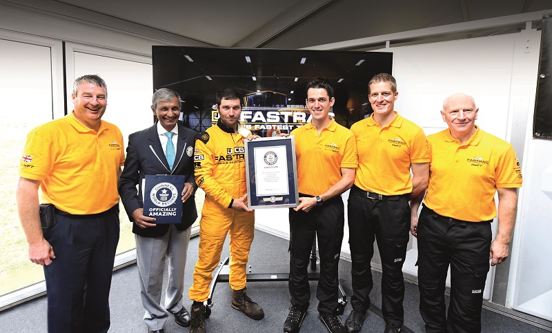 JCB's Tim Burnhope, Pravin Patel, of Guinness World Records, Guy Martin, JCB's Alex Skittery, JCB's Phil Price and JCB's Alan Tolley.jpg